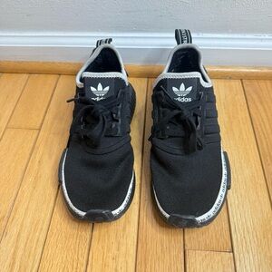Adidas NMD R1 black with white logo stripe